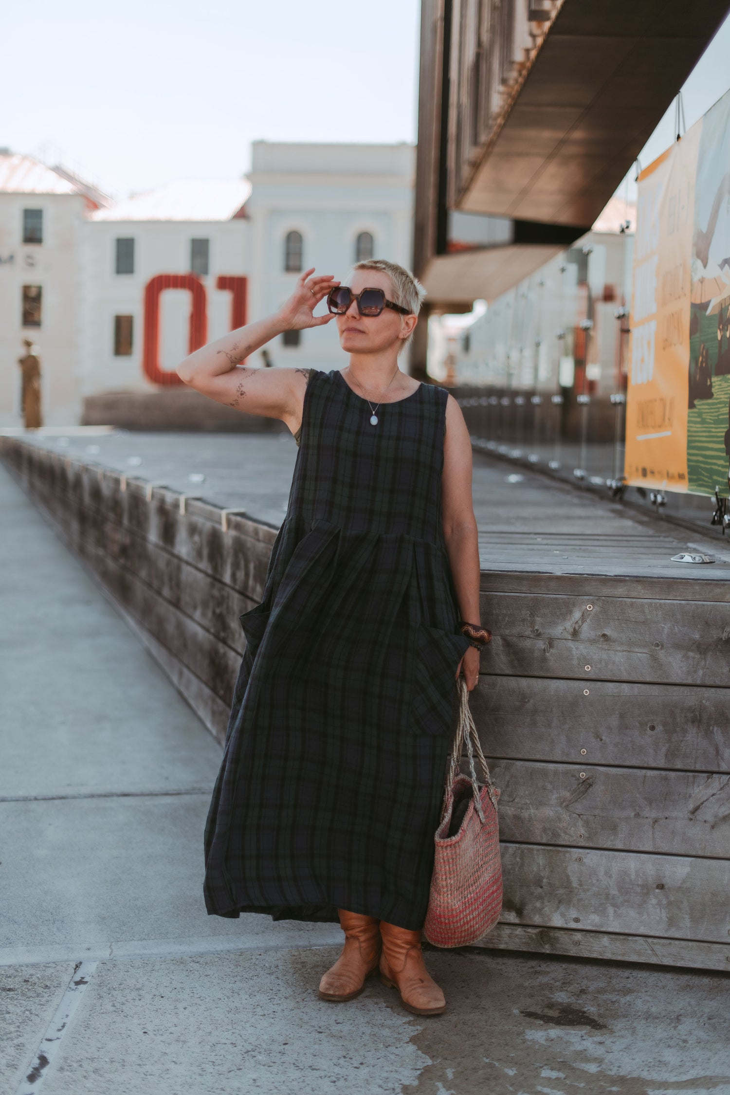Woman wearing a Montaigne linen dress in Australia.