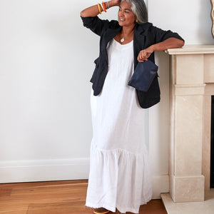 An effortlessly stylish maxi dress with adjustable spaghetti straps and a ruffled hem. It feels just as good on as it looks and is ideal for layering between seasons.
